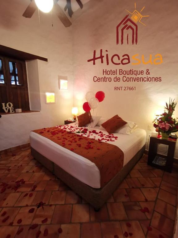 Postel nebo postele na pokoji v ubytování Hotel Hicasua y Centro de Convenciones