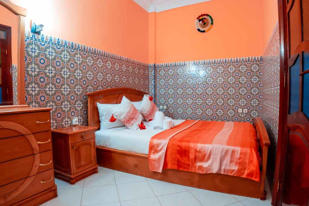Postel nebo postele na pokoji v ubytování DAR CHEFCHAOUEN