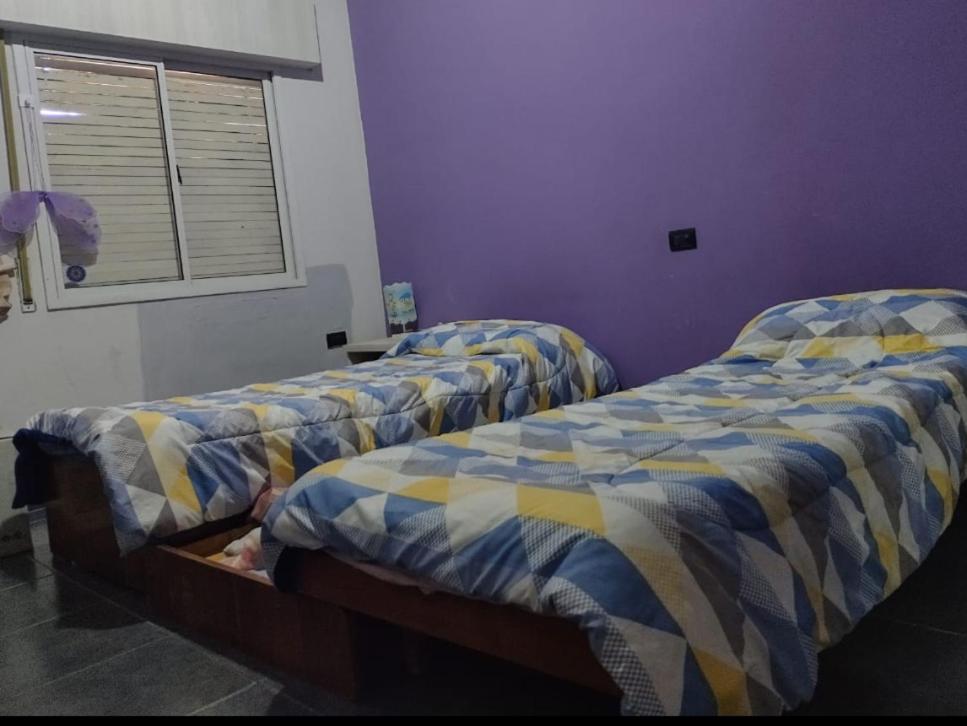 En eller flere senge i et værelse på La Rural