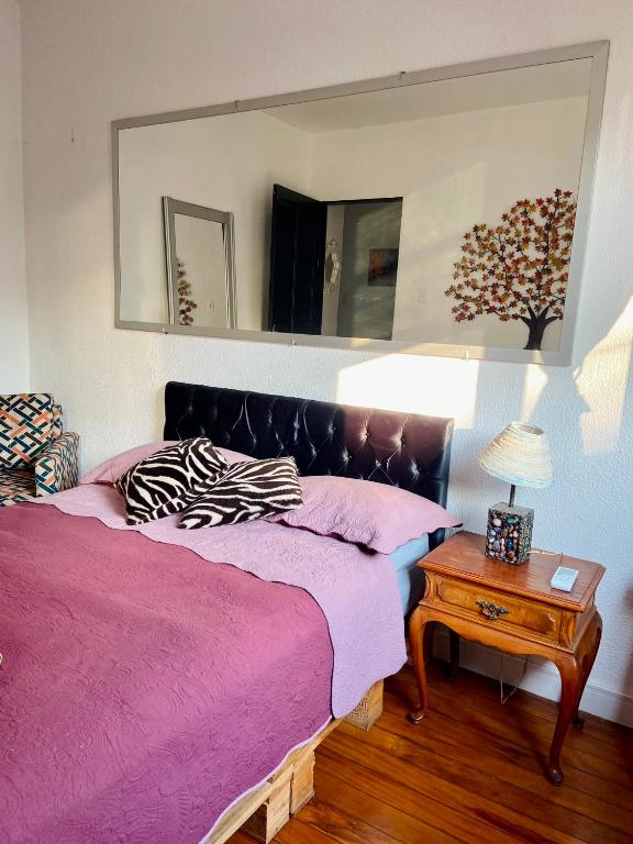 Uma cama ou camas num quarto em Galeria SP Hostel