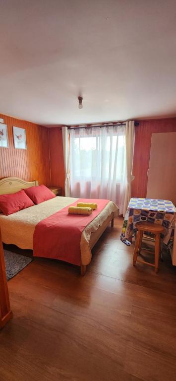Postel nebo postele na pokoji v ubytování Hostal La nona