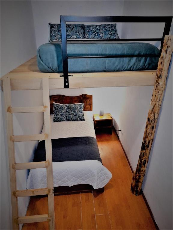 Postel nebo postele na pokoji v ubytování Casa Verde Descanso 1