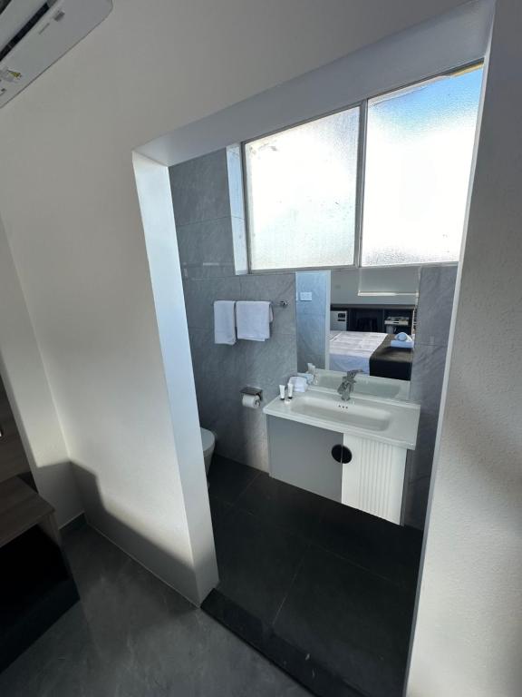 Kuchyň nebo kuchyňský kout v ubytování Darwin Resort