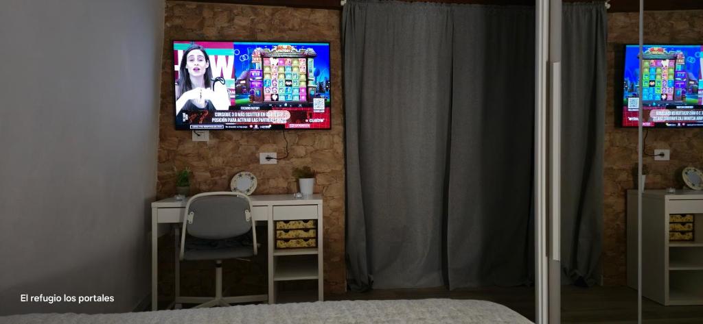 TV a/nebo společenská místnost v ubytování El refugio los portales