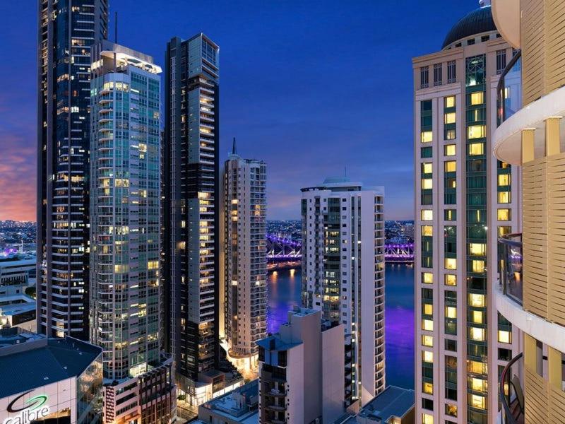 a view of a city at night with tall buildings at Riverview 2B2B apt in CBD w/parking, pool, gym in Brisbane