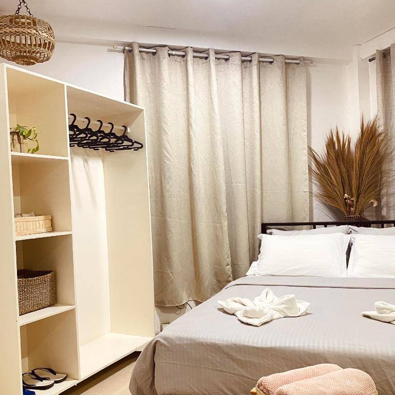 Letto o letti in una camera di Abihon HoferHaus Mactan Guesthouse
