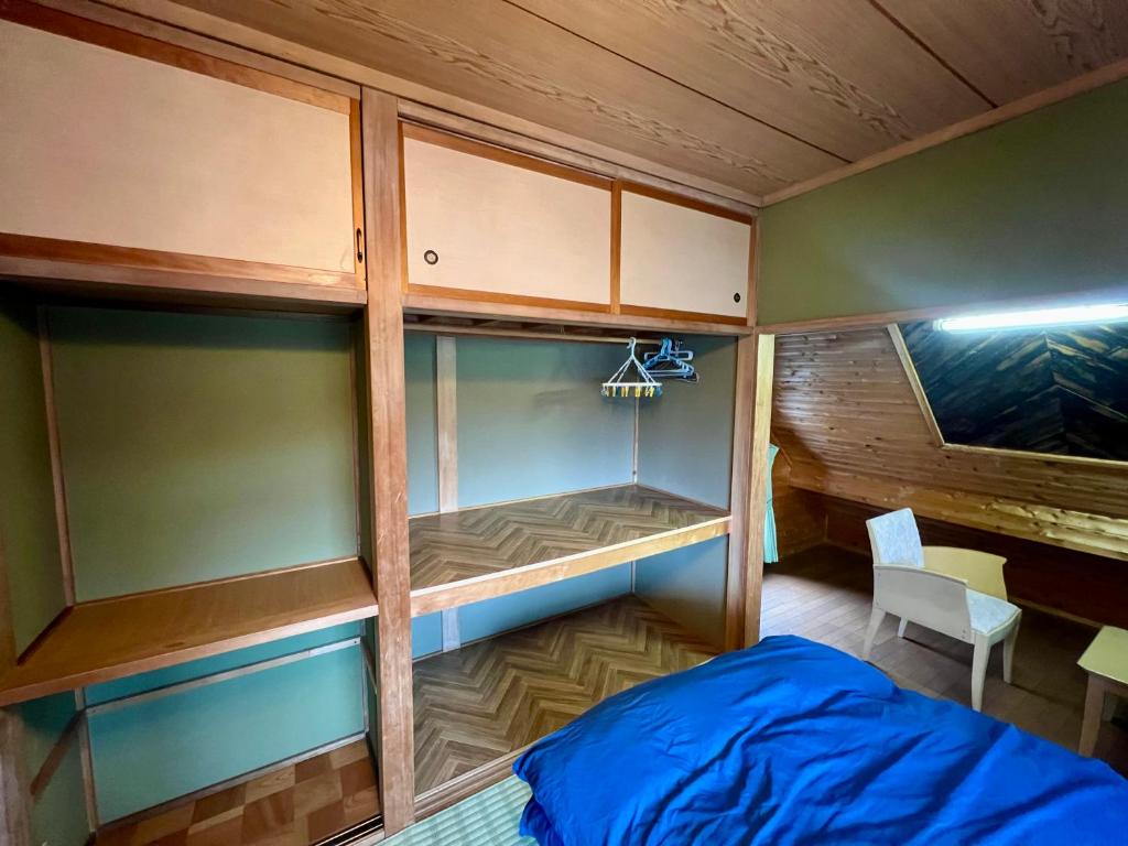Postel nebo postele na pokoji v ubytování Little Alaskan Guest House