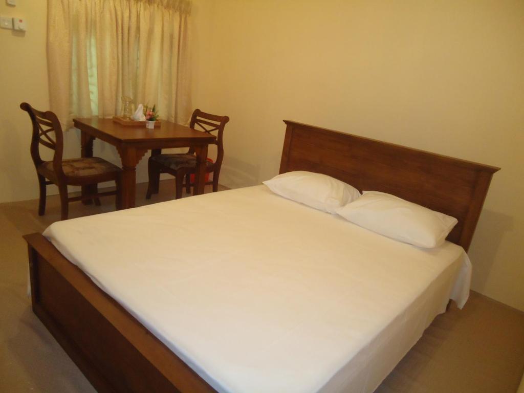 Postel nebo postele na pokoji v ubytování Guest House