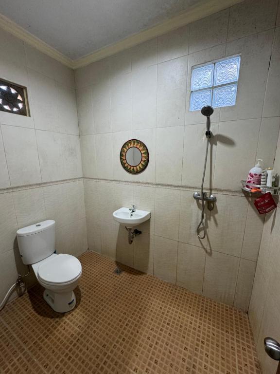 Koupelna v ubytování Nua House