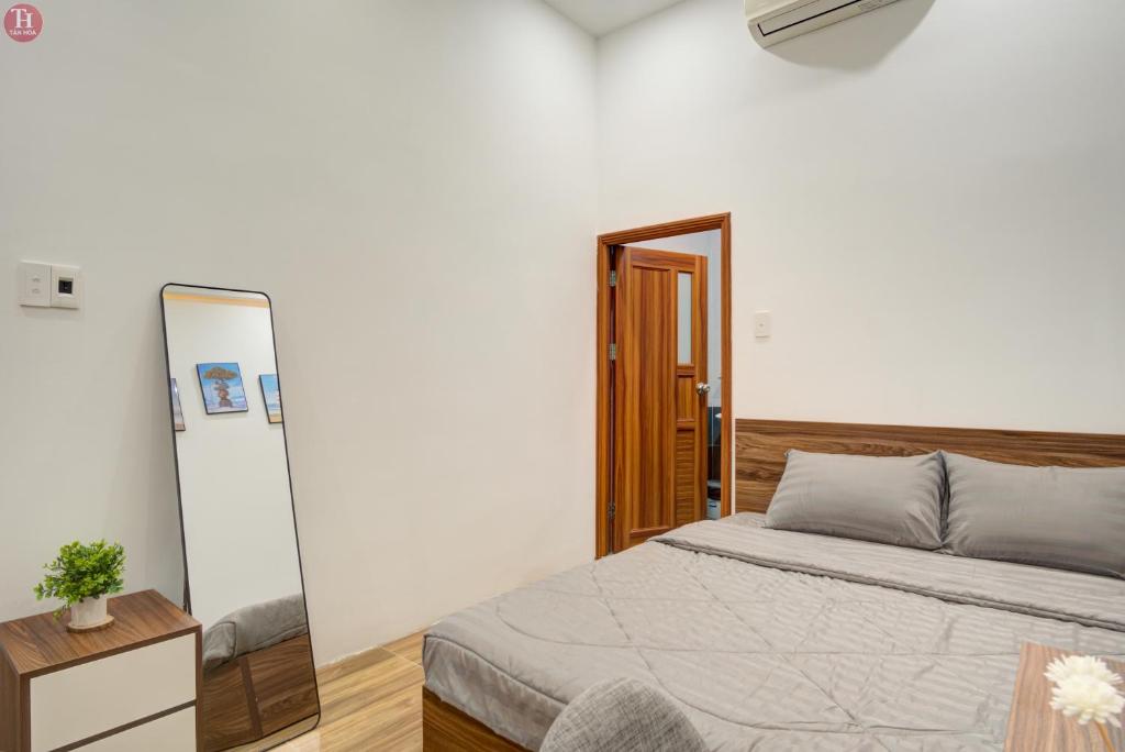 Ein Bett oder Betten in einem Zimmer der Unterkunft Tân Hoà Homestay Da Nang