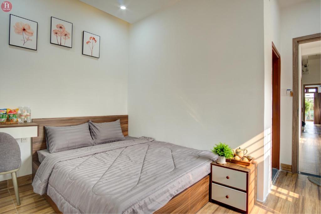 Ein Bett oder Betten in einem Zimmer der Unterkunft Tân Hoà Homestay Da Nang