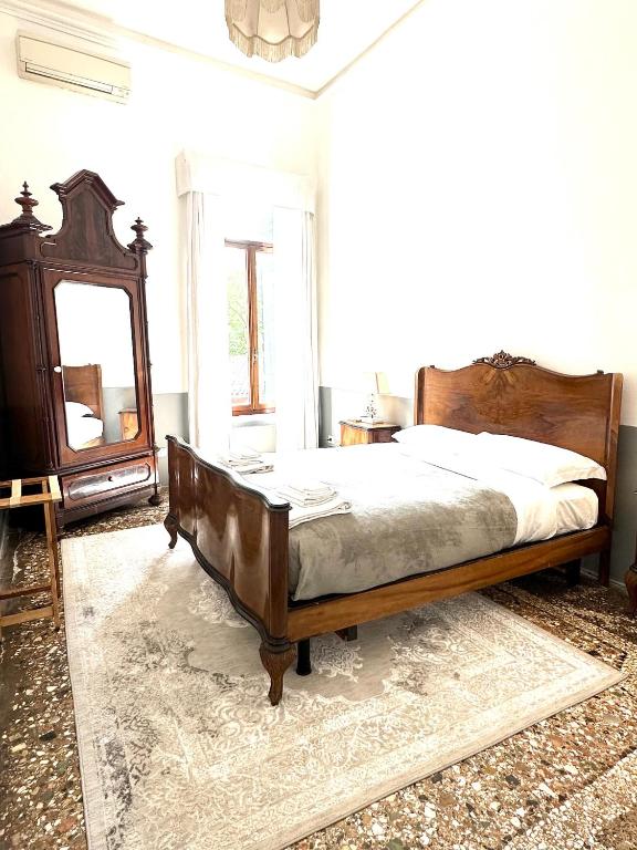 Postel nebo postele na pokoji v ubytování Wisteria Lodge by Veneto Villa