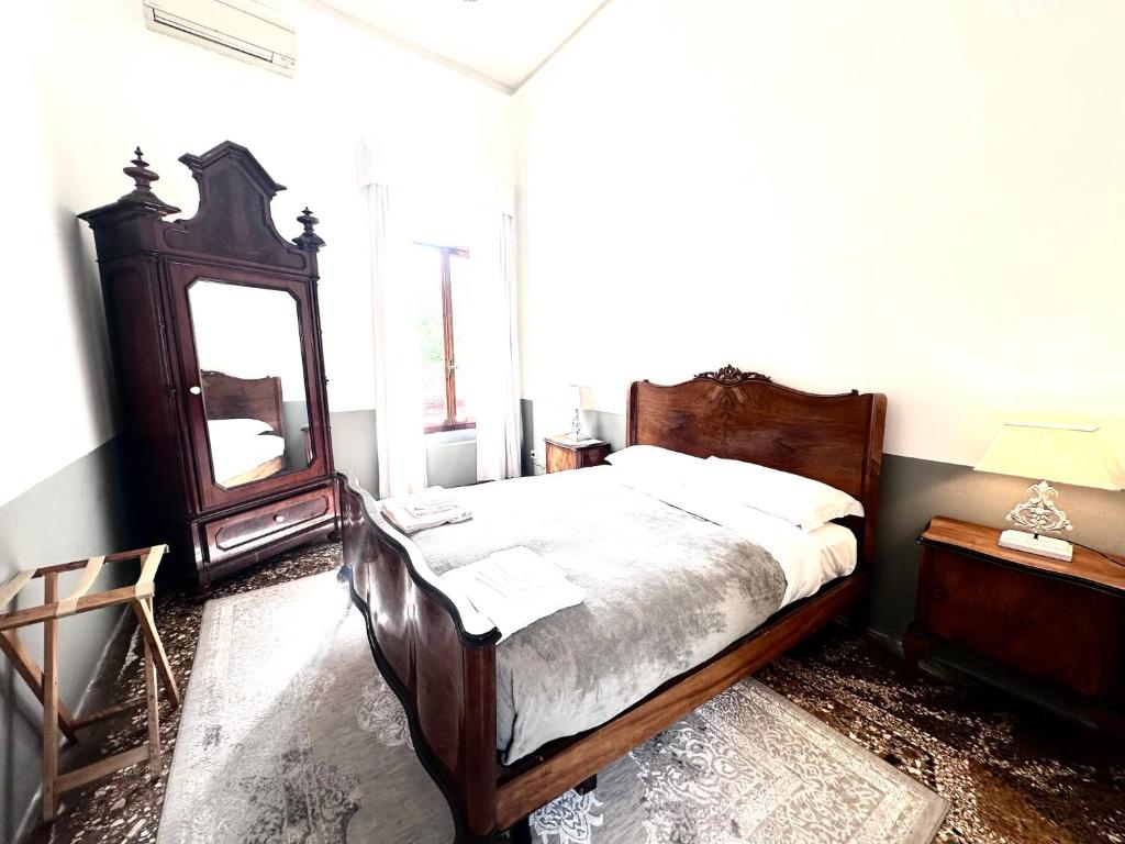 Postel nebo postele na pokoji v ubytování Wisteria Lodge by Veneto Villa