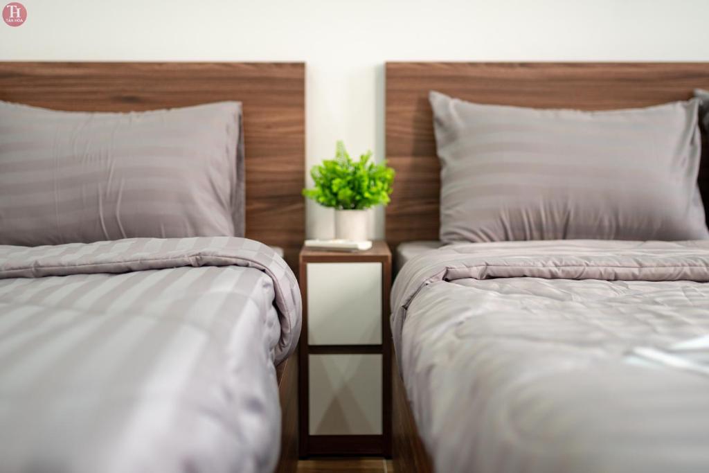 Ein Bett oder Betten in einem Zimmer der Unterkunft Tân Hoà Homestay Da Nang