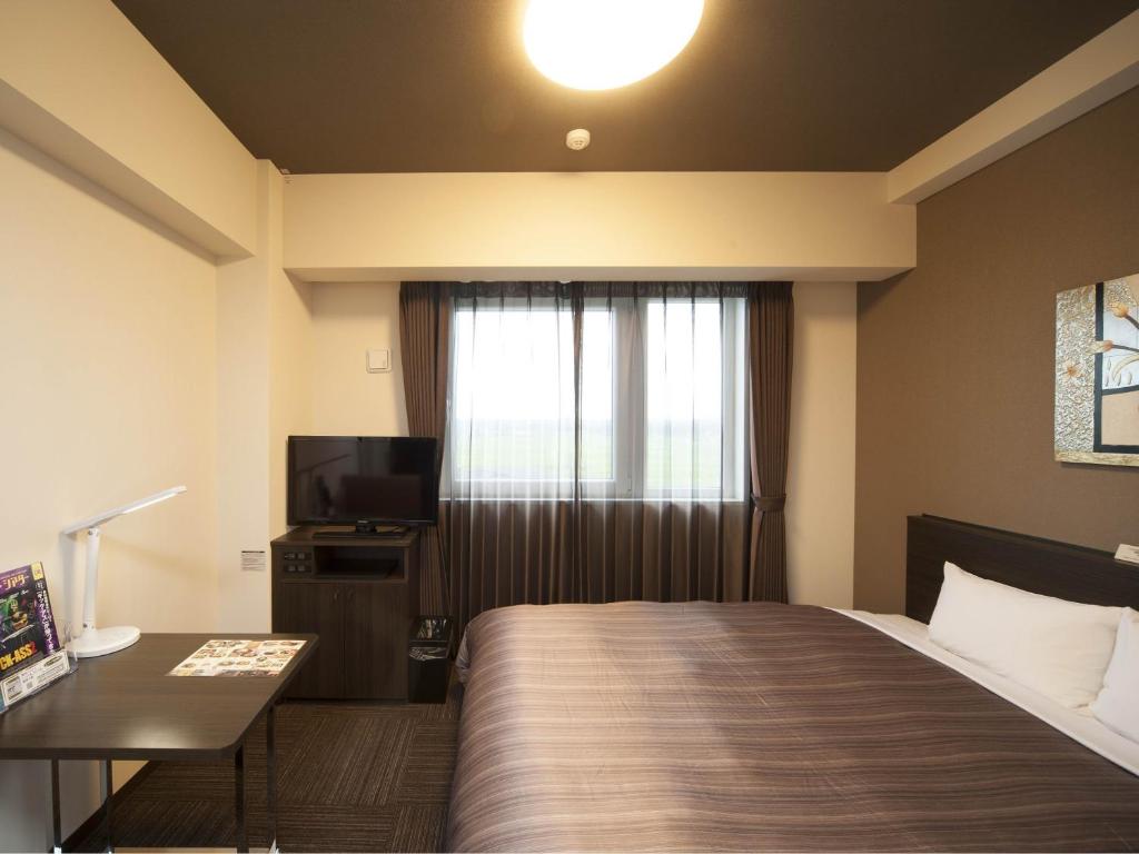 TV a/nebo společenská místnost v ubytování Hotel Route Inn Ono