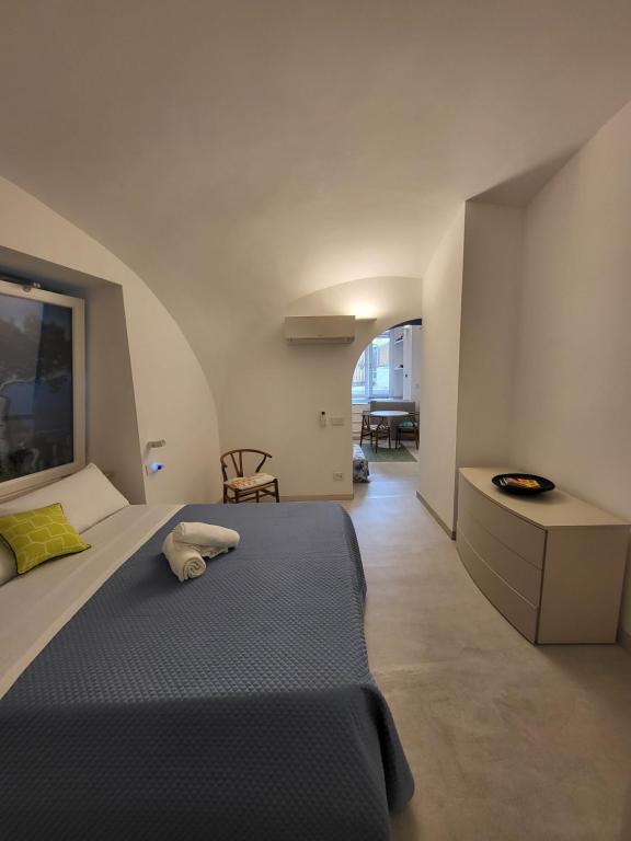 Posteľ alebo postele v izbe v ubytovaní Casa Capri Mores