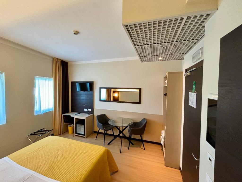 TV a/nebo společenská místnost v ubytování Hotel Alverì