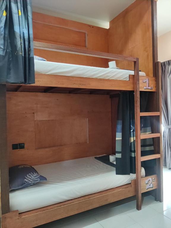 Postel nebo postele na pokoji v ubytování Jungle Ippie Hostel