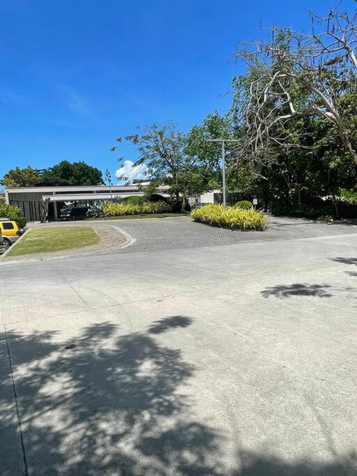 an empty street with a building in the background at Ma Roberta - Tambuli Resort with fast Wifi 16 Floor Studio Type in Lapu Lapu City