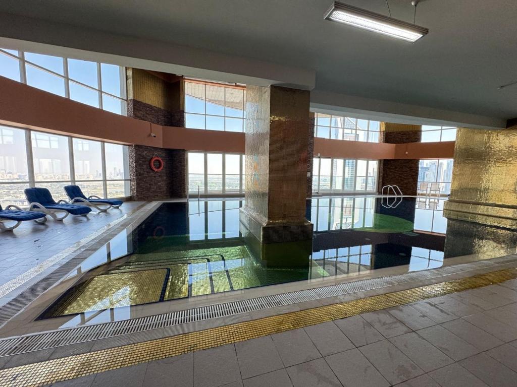 Swimming pool sa o malapit sa 1 Bedroom Furnished Apartment Front of Future Museum - Trade Center Dubai