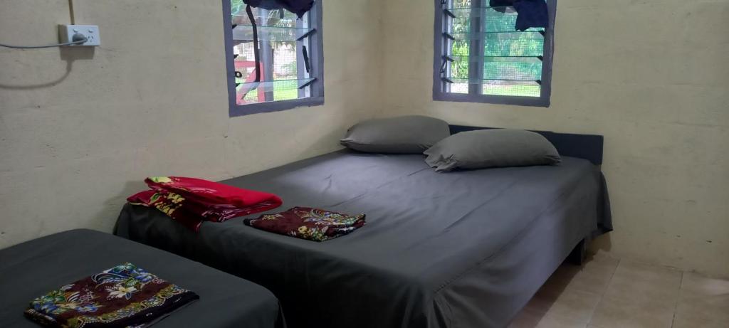 Postel nebo postele na pokoji v ubytování Outback Retreat/Hotel, Ba Fiji