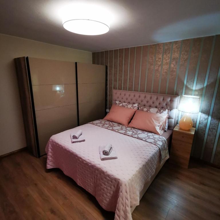Postel nebo postele na pokoji v ubytování CASA BLANCA