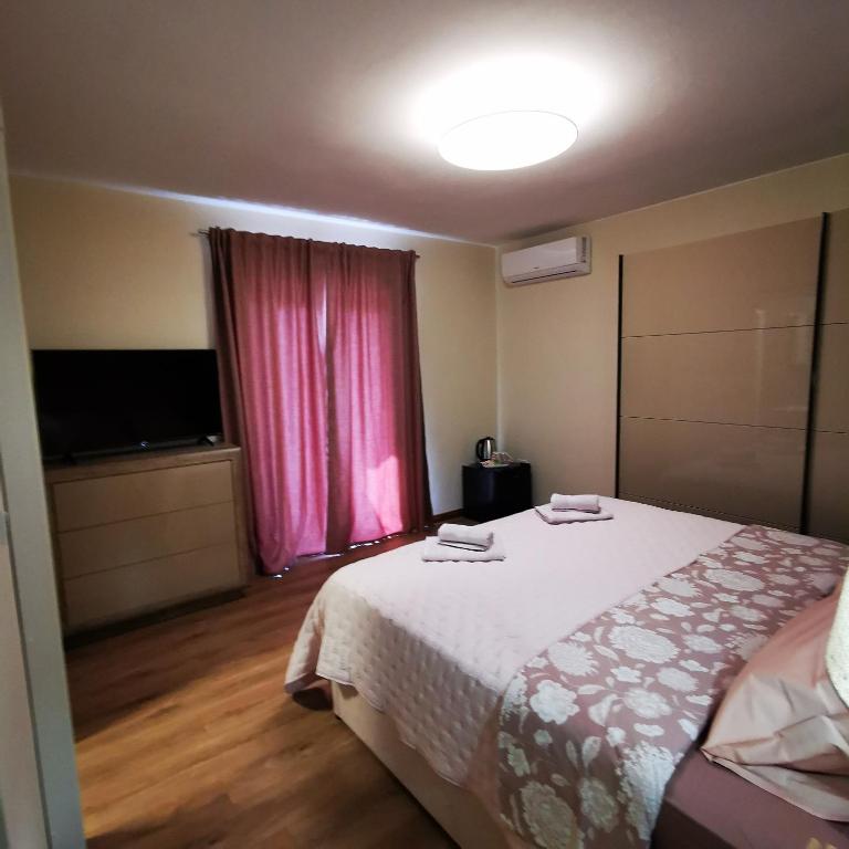 Postel nebo postele na pokoji v ubytování CASA BLANCA