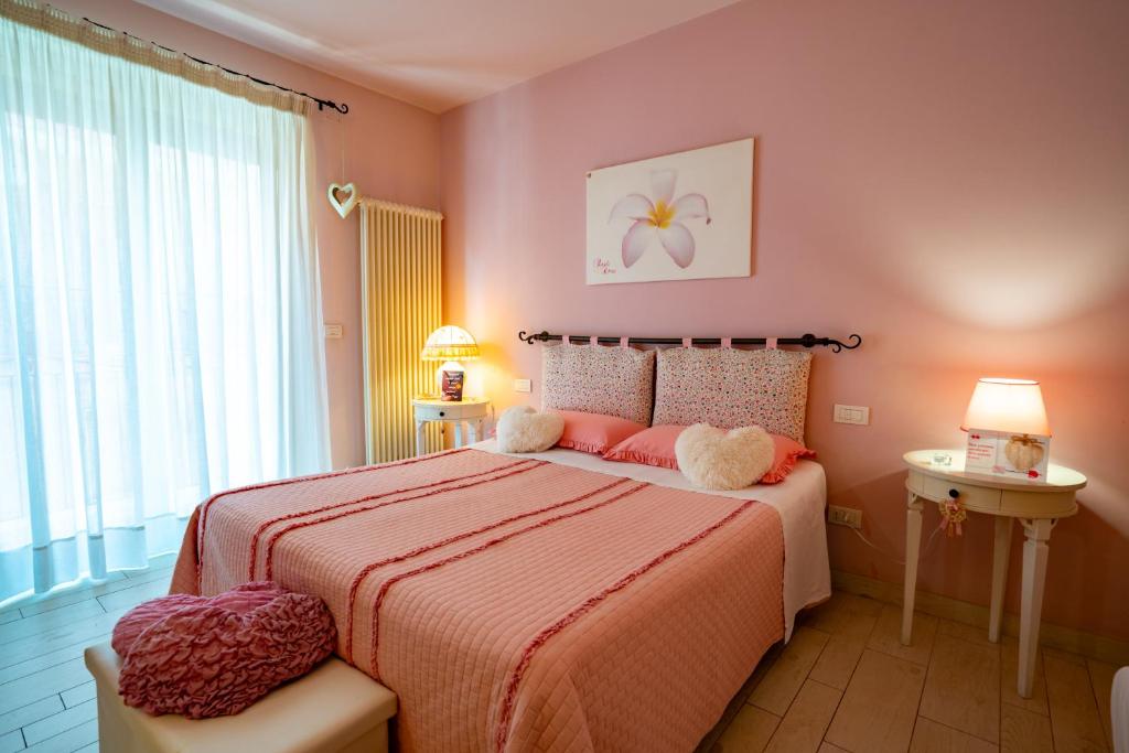 Postel nebo postele na pokoji v ubytování Petali Rosa