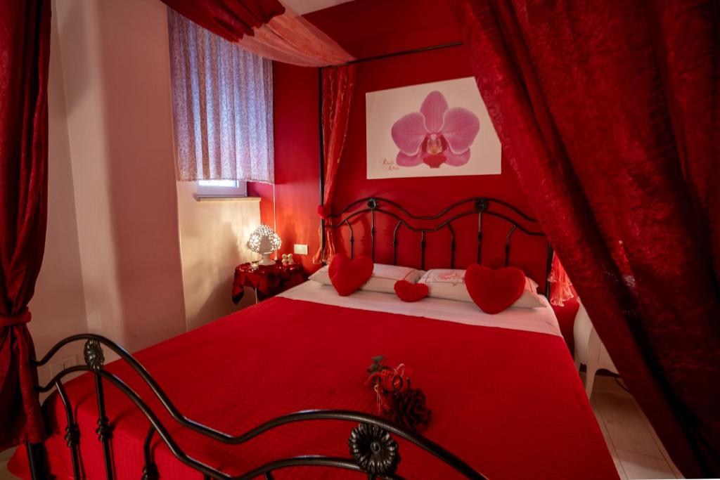Postel nebo postele na pokoji v ubytování Petali Rosa