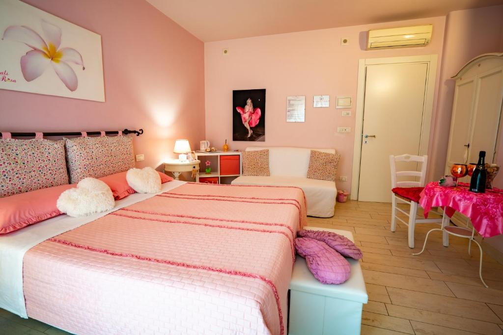 Postel nebo postele na pokoji v ubytování Petali Rosa