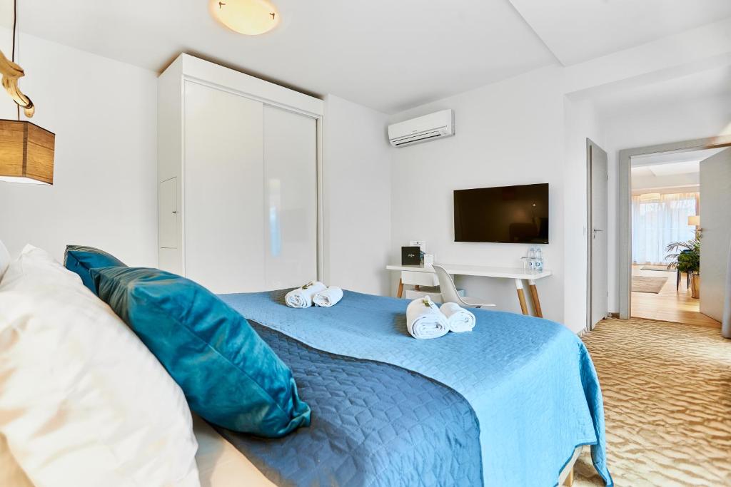TV a/nebo společenská místnost v ubytování West Baltic Resort Wellness & Spa