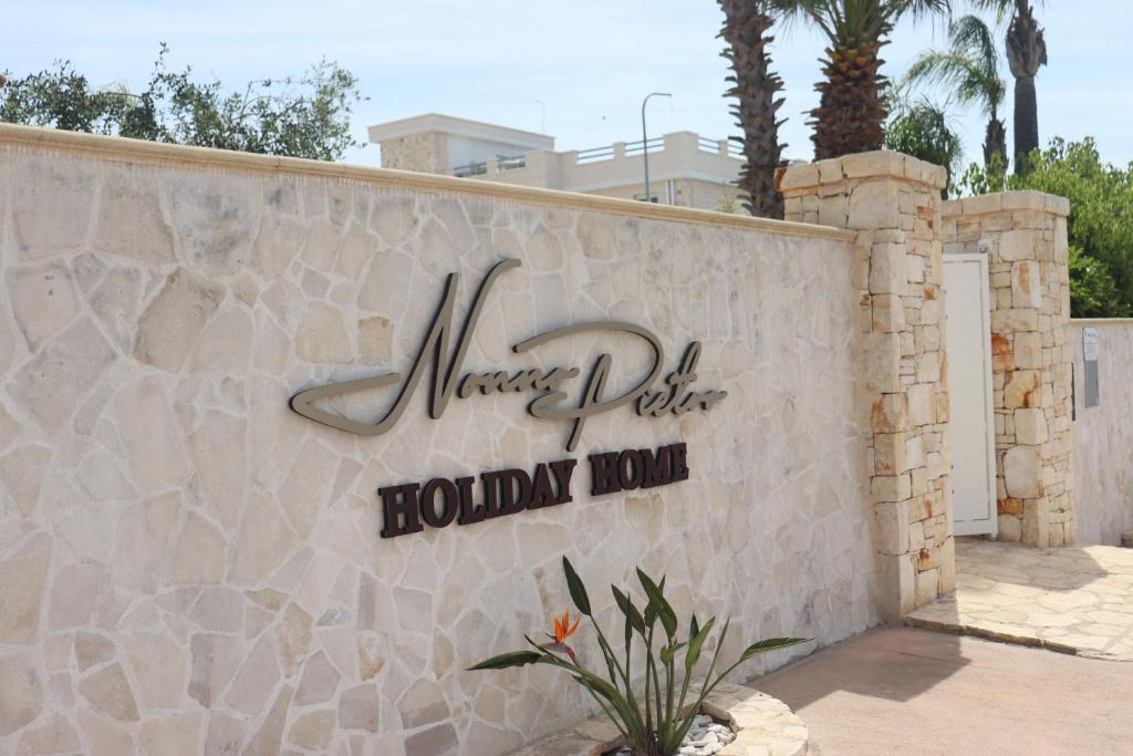 a sign for the marriott waverly ridge holiday inn at Da Nonno Pietro in Pulsano