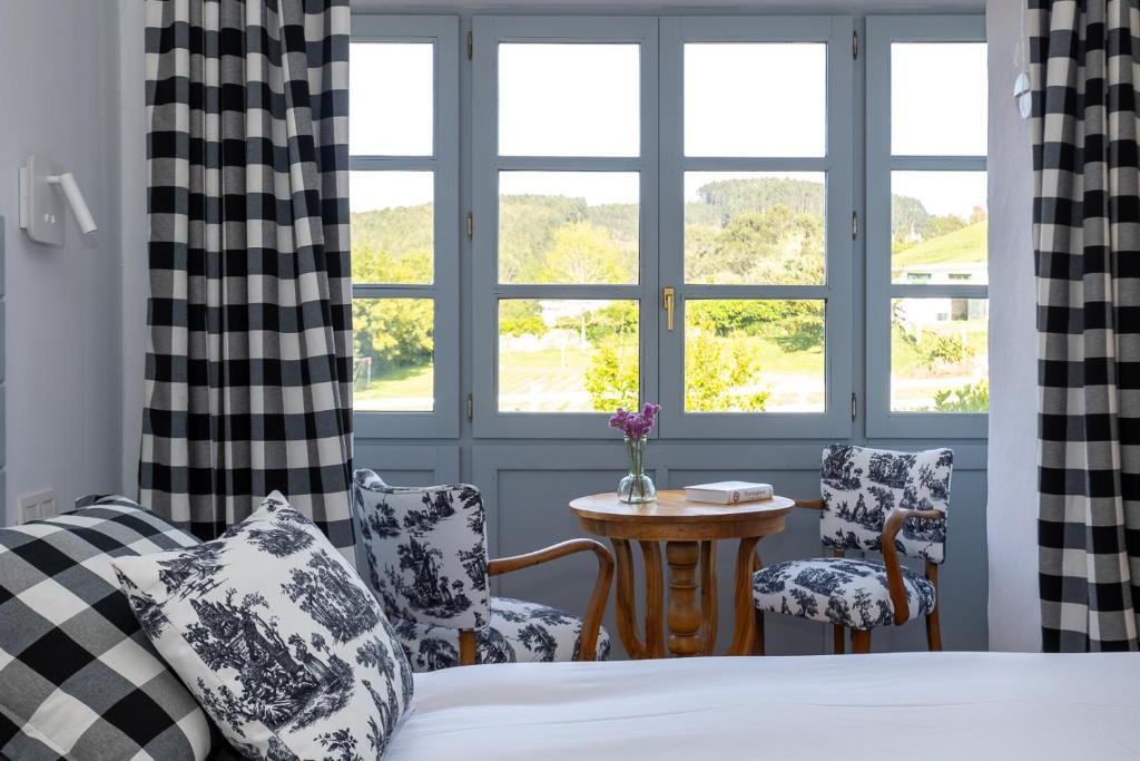 A bed or beds in a room at Casona Las Cinco Calderas