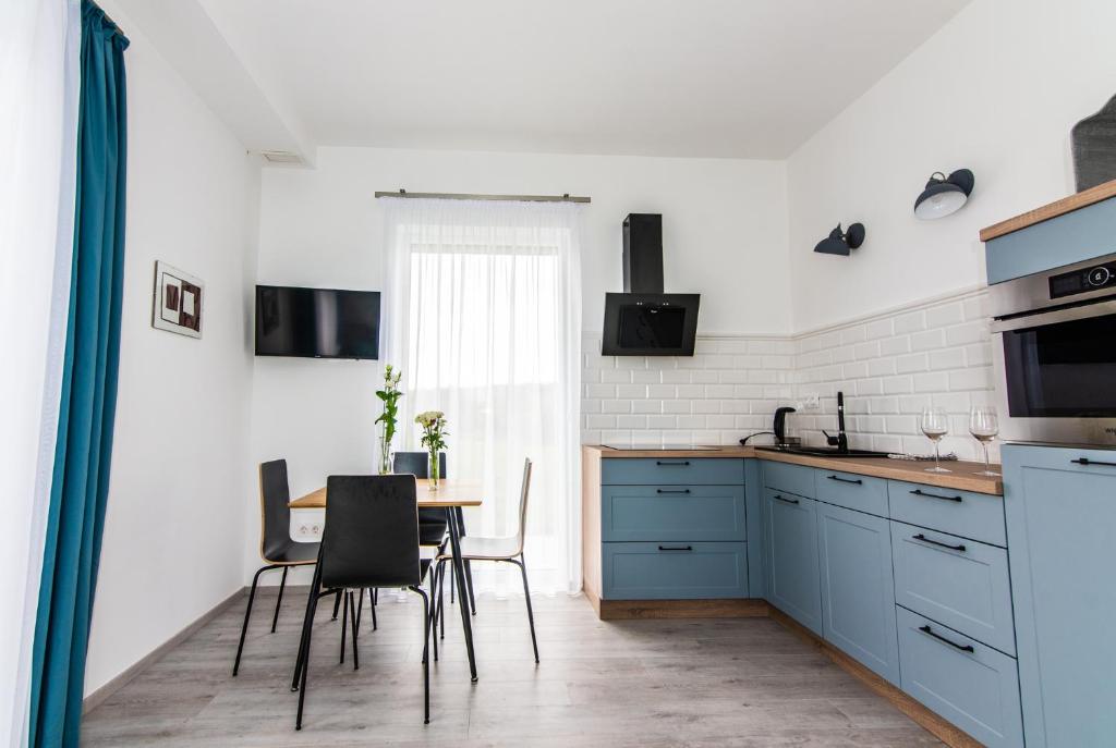 Kuchyň nebo kuchyňský kout v ubytování Vinorell Apartman