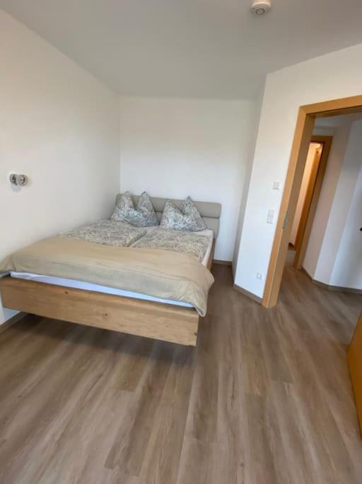 Postel nebo postele na pokoji v ubytování West shore Appartement