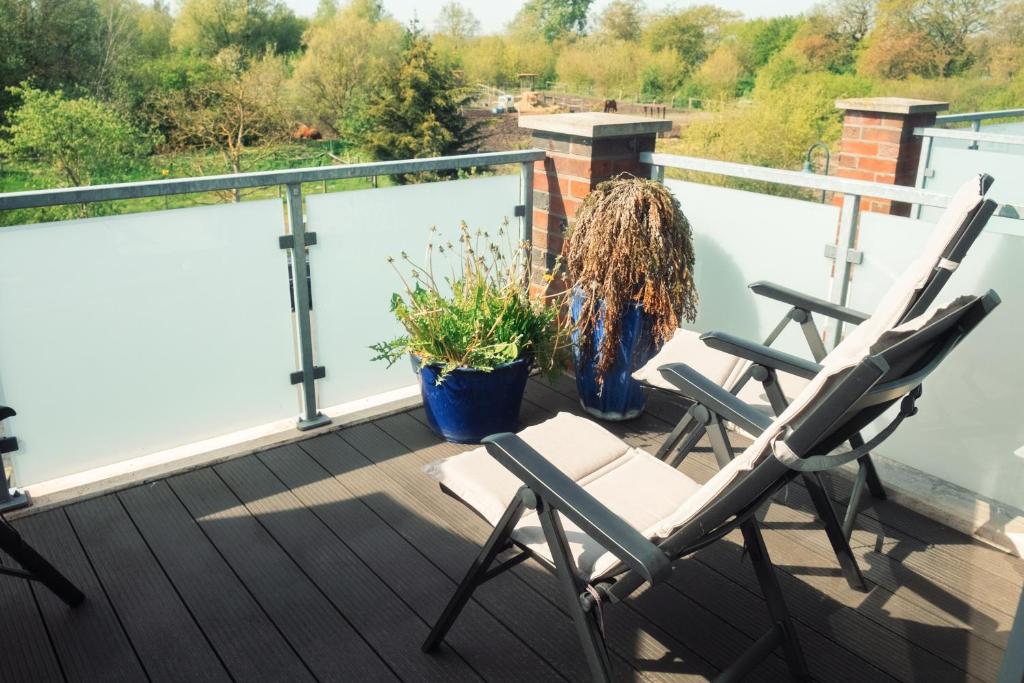 Balkón nebo terasa v ubytování Meerzeit - Sauna und Kamin - moderne FeWo