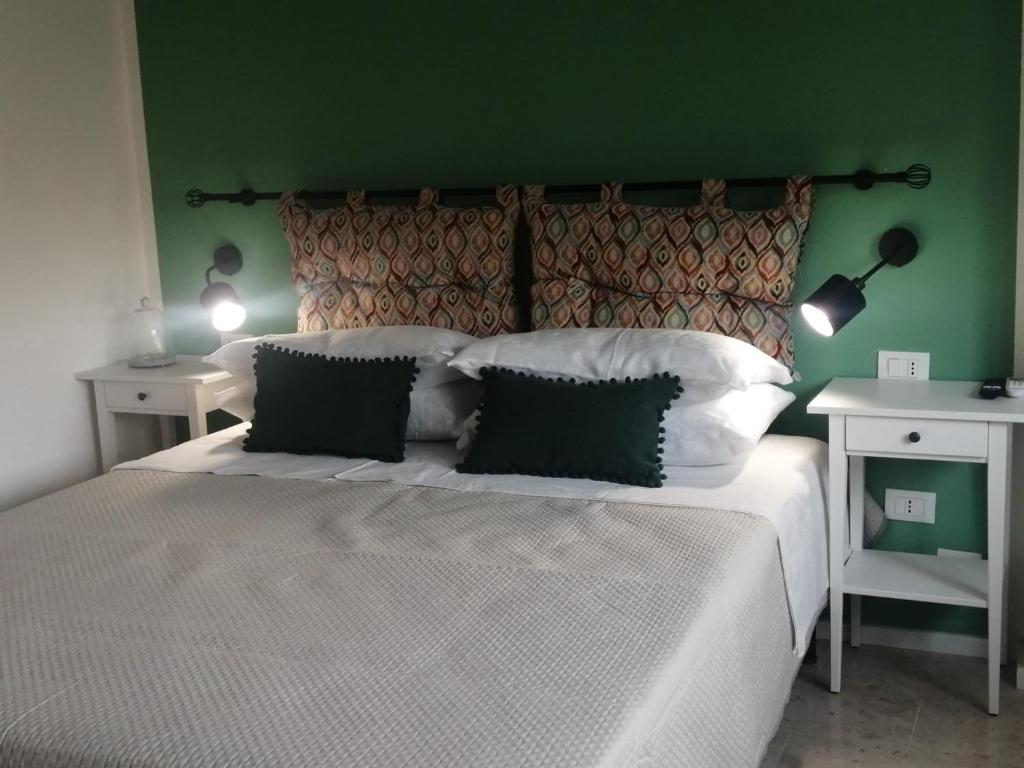 Postel nebo postele na pokoji v ubytování Studio Florio
