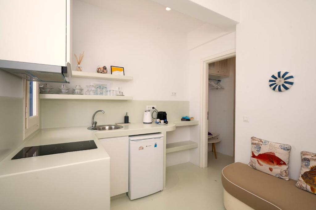 Kuchyň nebo kuchyňský kout v ubytování Hyades - Downtown Suites, Mykonos Town