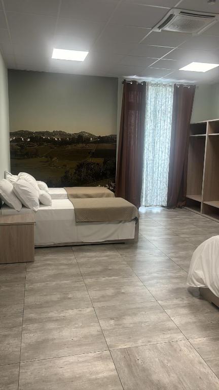 Postel nebo postele na pokoji v ubytování Volpedo hostel