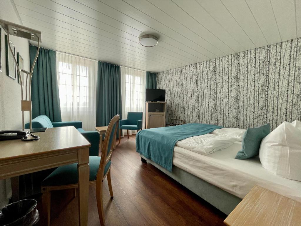 Ένα ή περισσότερα κρεβάτια σε δωμάτιο στο Hotel Am Schloss *** Superior