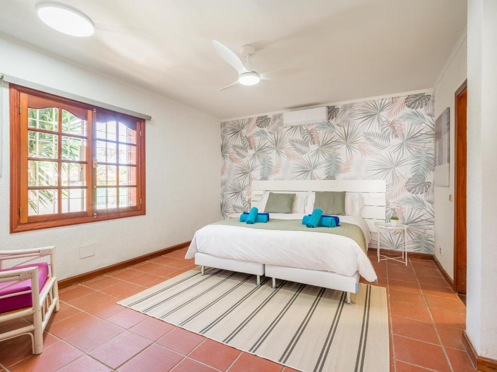 Łóżko lub łóżka w pokoju w obiekcie CASA GRAN CANARIA - Gran Canaria Stays