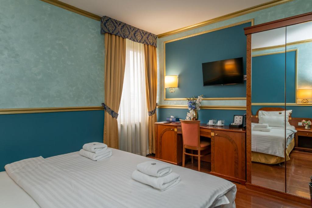 TV a/nebo společenská místnost v ubytování Hotel Kinsky Fountain