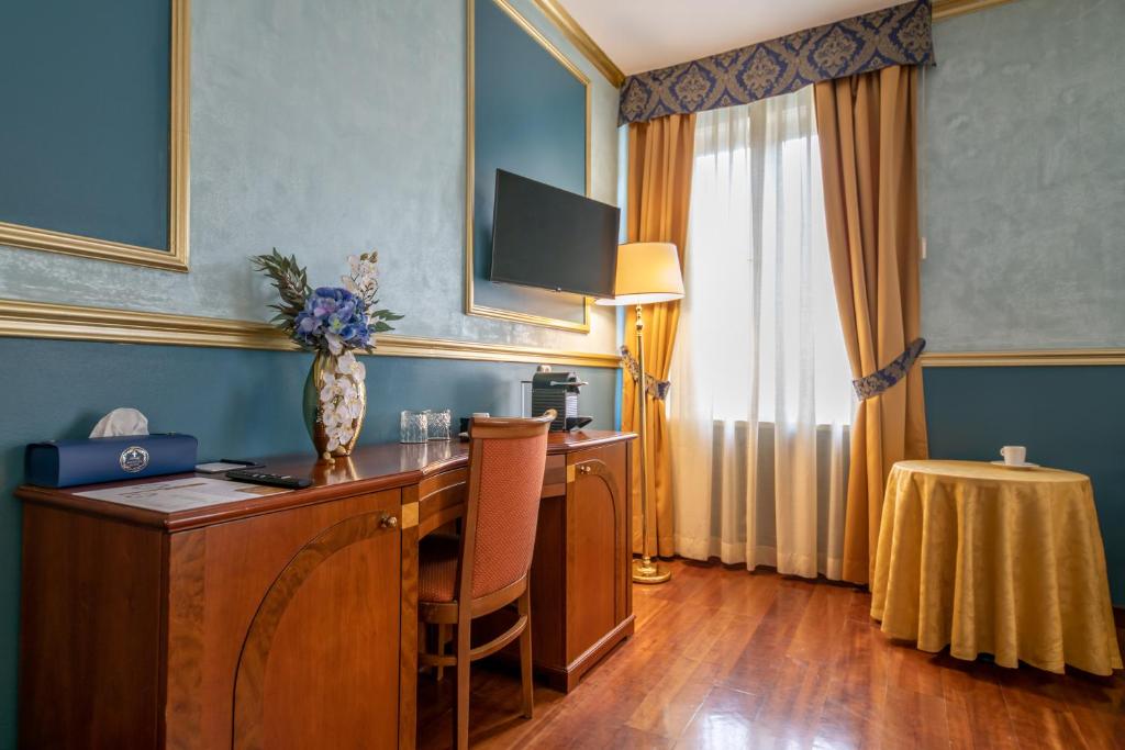 TV a/nebo společenská místnost v ubytování Hotel Kinsky Fountain