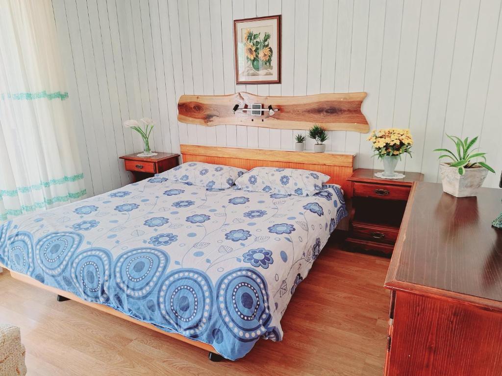 Postel nebo postele na pokoji v ubytování Apartma Ferjan