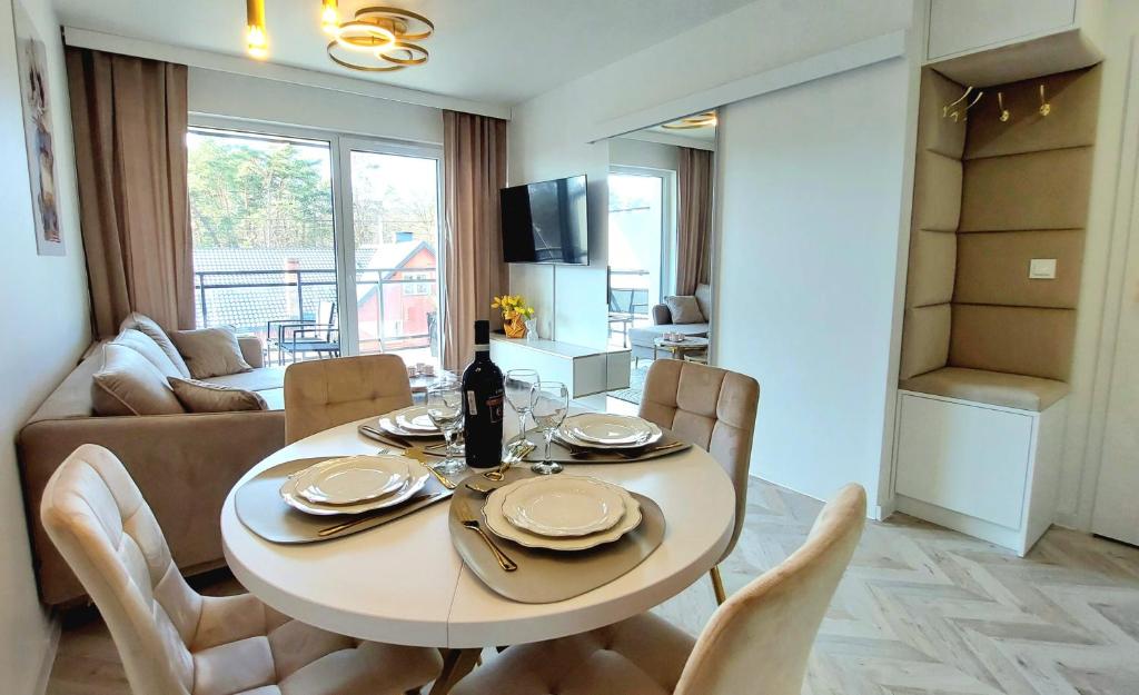 TV a/nebo společenská místnost v ubytování Jantart Resort Słońce Jantaru by TriApart