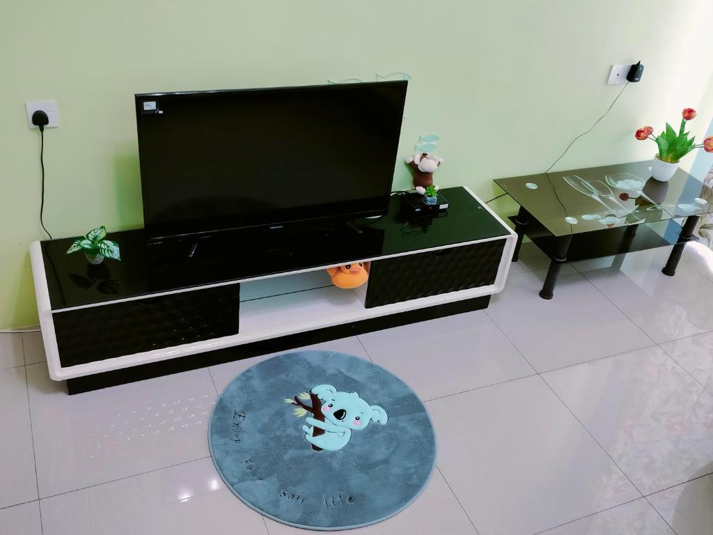TV a/nebo společenská místnost v ubytování Idea Homestay 1