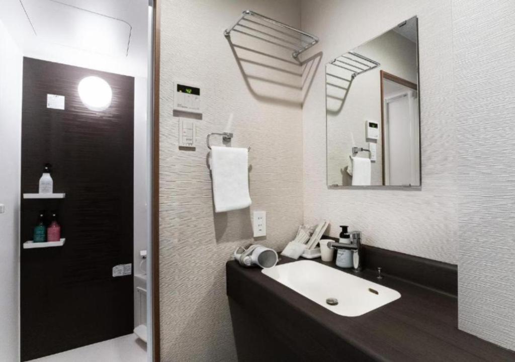 Koupelna v ubytování HOTEL DORIA