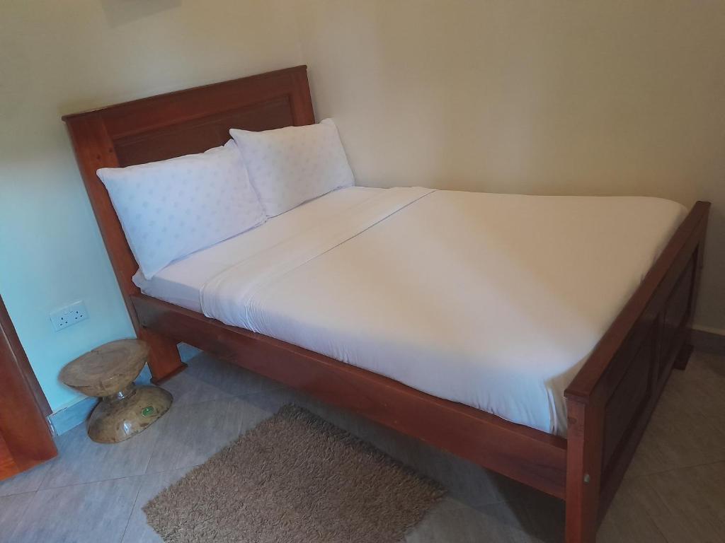 Postel nebo postele na pokoji v ubytování BeezBinn