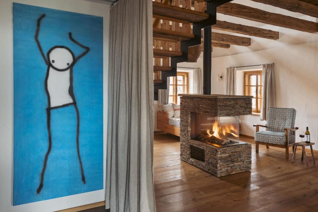 Posezení v ubytování Am Wildbachberg - Luxus Ferienhäuser mit Infinitypool, Privatsauna und Weinkeller