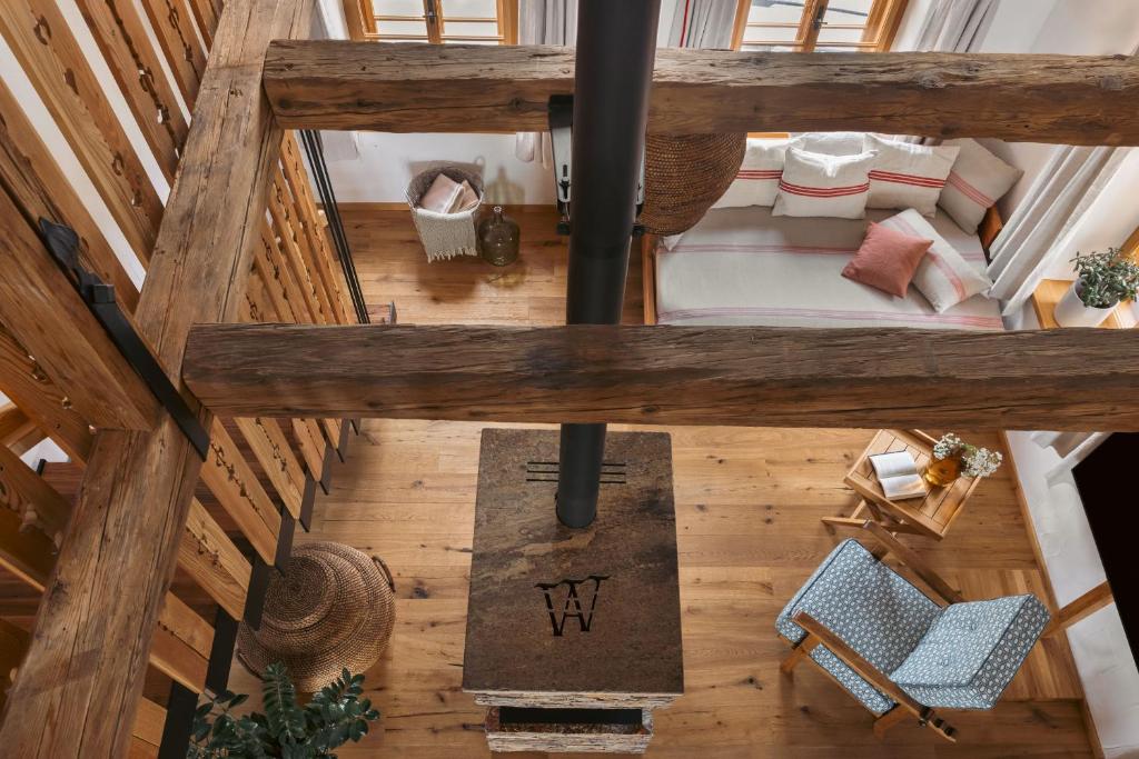 Postel nebo postele na pokoji v ubytování Am Wildbachberg - Luxus Ferienhäuser mit Infinitypool, Privatsauna und Weinkeller